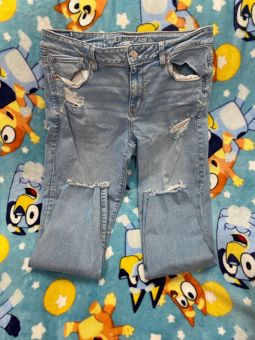 American Eagle Outfitters Light Blue Distressed Ankle Jeans